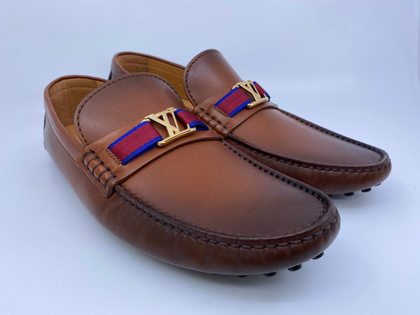 Sold at Auction: LOUIS VUITTON - HOCKENHEIM SUEDE MOCCASIN LOAFERS - ORANGE  - MENS US 9.5 - 43