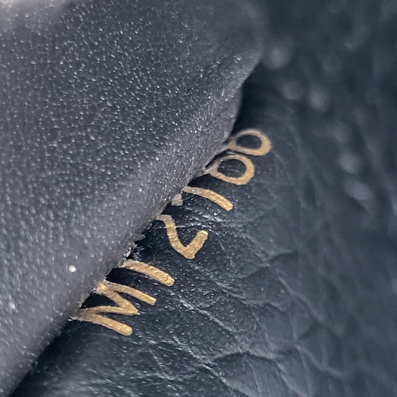 Louis Vuitton Women's Black Leather Capucines Sunny Wallet – Luxuria & Co.
