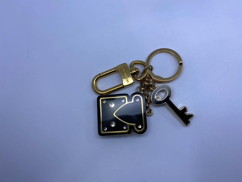 Louis Vuitton Brass Lock and Key Set - Gold Bag Accessories, Accessories -  LOU777691