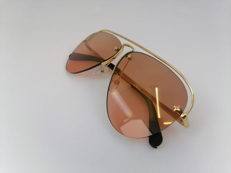 Louis Vuitton Gold Tone/Orange Grease Gradient Aviators Sunglasses at  1stDibs  louis vuitton grease sunglasses, louis vuitton aviator sunglasses,  louis vuitton sunglasses