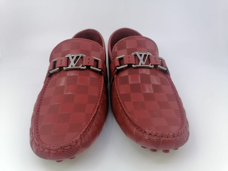 Louis Vuitton Pair of red loafer Size : 38 With its dust…