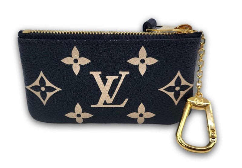 Louis Vuitton Women's Bi-Color Monogram Empreinte Key Pouch M80885 –  Luxuria & Co.
