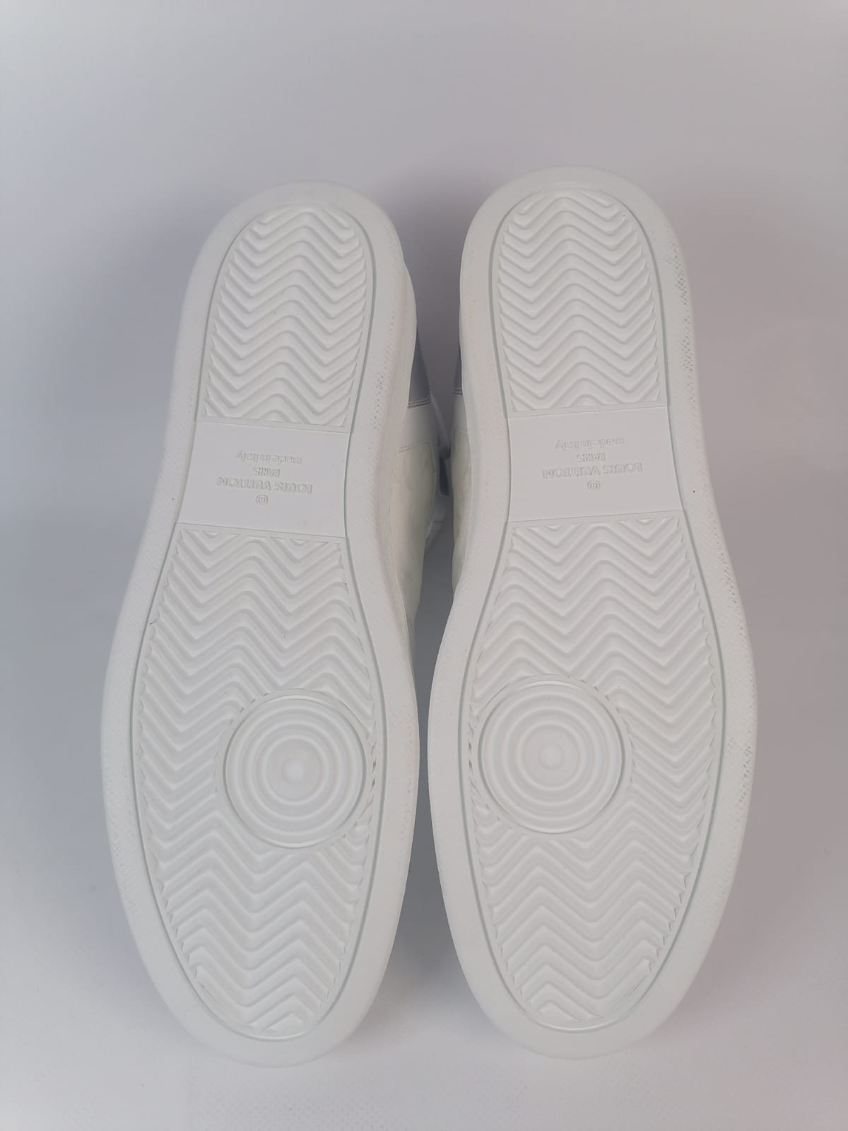 Louis Vuitton ボディスーツ ホワイト Louis Vuitton Men's White Monogram Empreinte Rivoli Sneaker