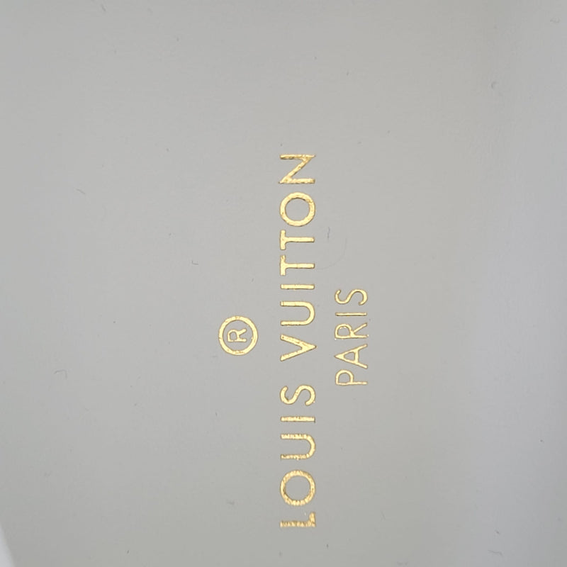 Louis Vuitton Men's White Monogram Empreinte Rivoli Sneaker Boot – Luxuria  & Co.