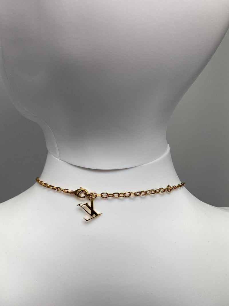 Louis Vuitton Women's Resin & Brass Lock Me Heart Pomme D'Amour Necklace –  Luxuria & Co.