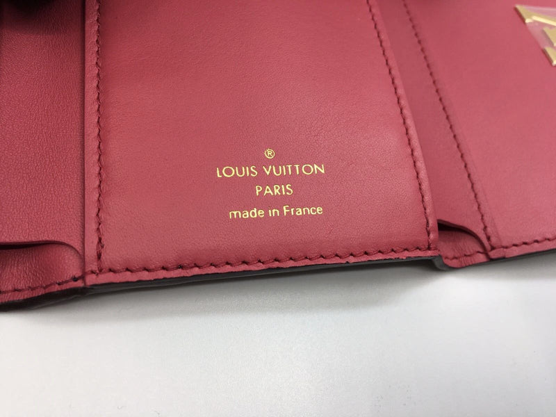 Louis Vuitton Women's Black Taurillion Leather Capucines Compact Sunny  Wallet M63463 – Luxuria & Co.