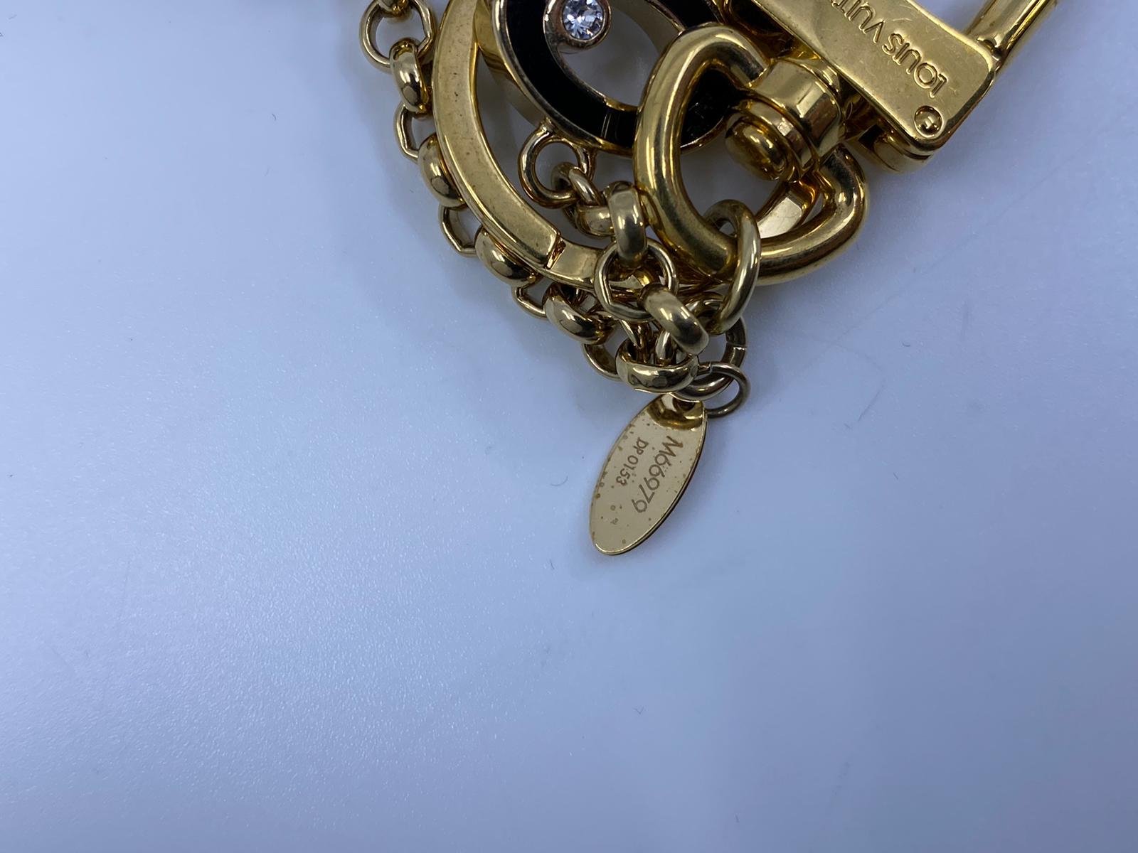 Louis Vuitton Brass & Enamel Lock & Key Bag Charm – Luxuria & Co.