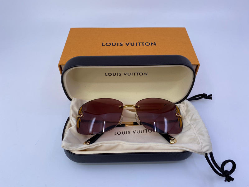 Authentic Louis Vuitton Gold with Gradient Blue Lenses Desmayo