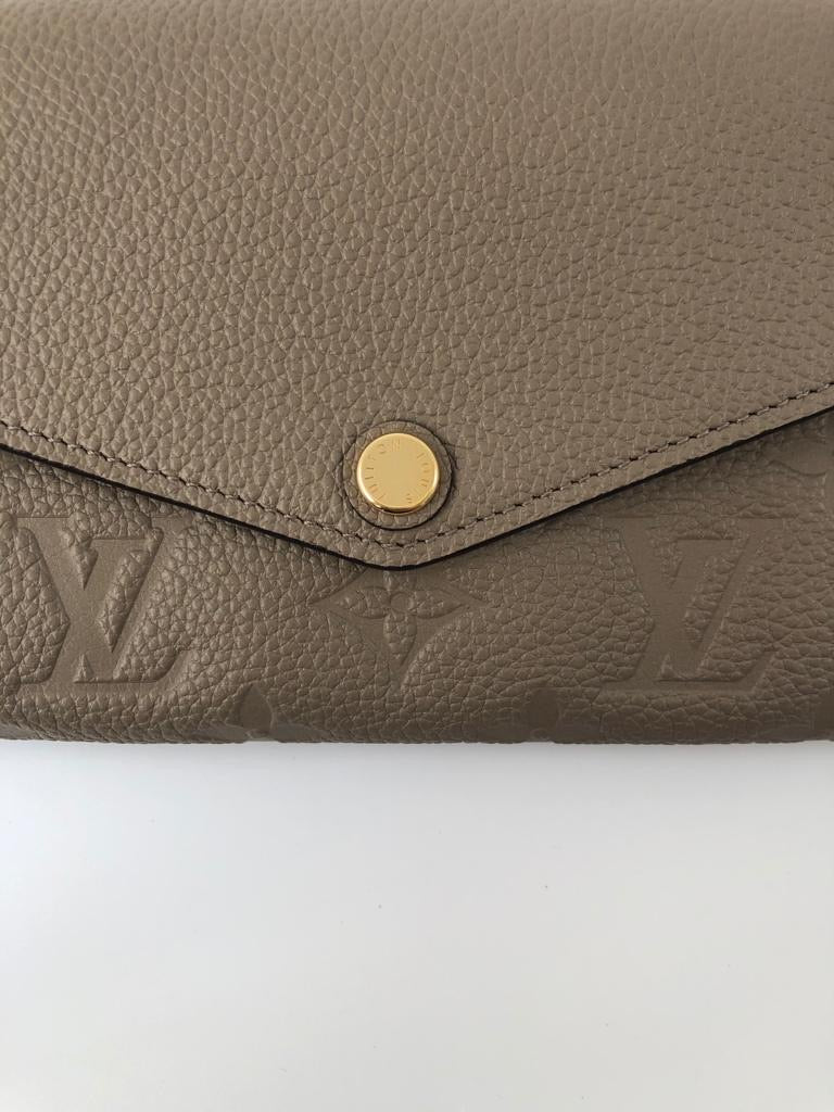Louis Vuitton 8 Credit Card Insert Beige Empreinte Leather wallet from –  Debsluxurycloset